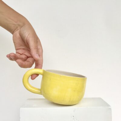 Knallgelbe Henkeltasse